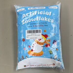 Festive Artificial Snowflakes for Parties. A new bag of fresh fake snow. Snow